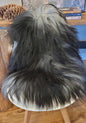 black shaggy sheepskin rug